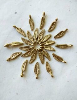 Mini feather charms – Handcrafted brass feather details.