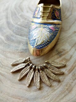 Mini feather charms – Handcrafted brass feather details.
