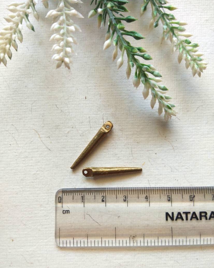 Stick charms – Elegant and unique brass charm pieces.