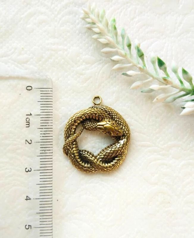 Intricate Brass Twisted Snake Charm Pendant - Image 2