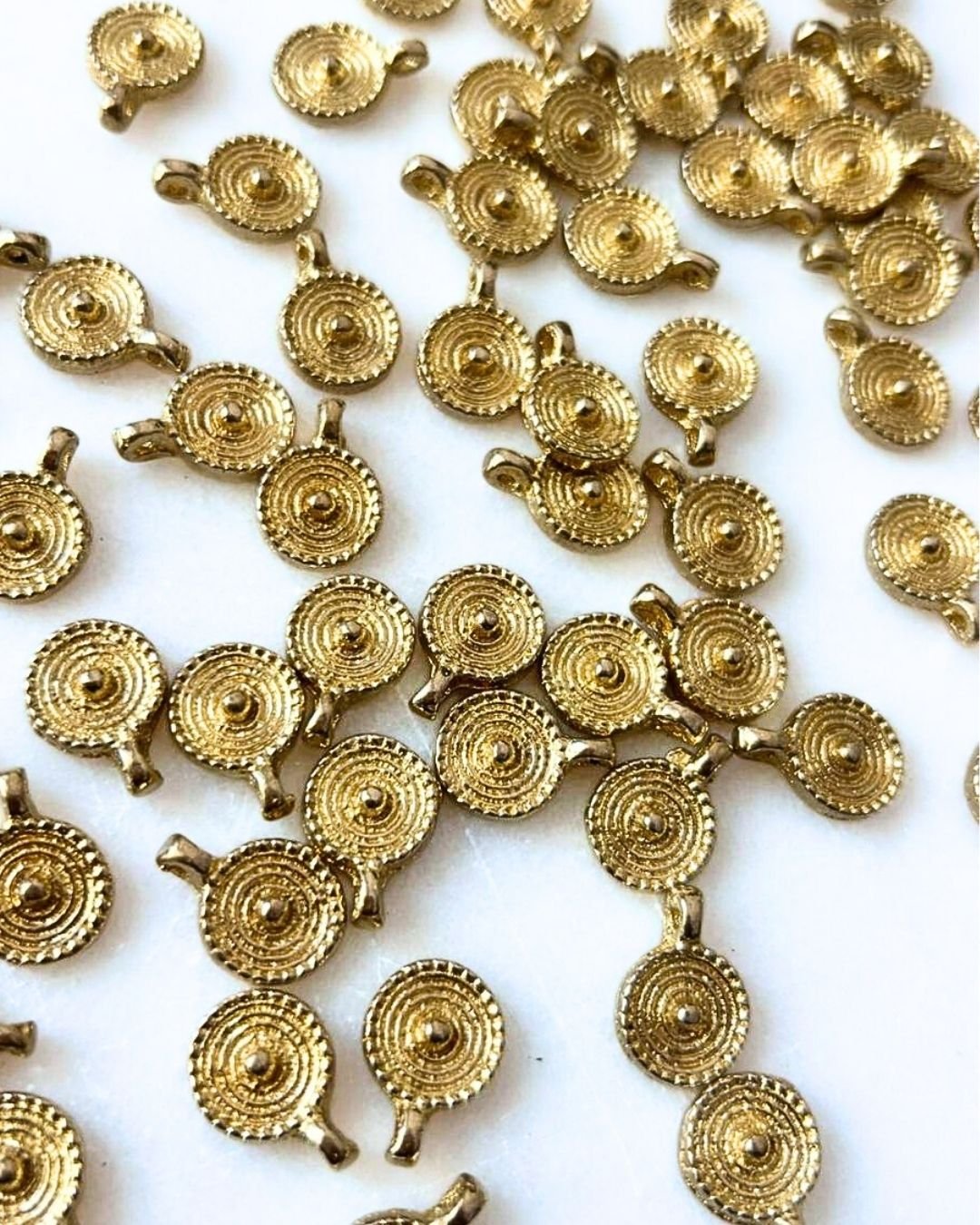 Spiral Sun Brass Charms