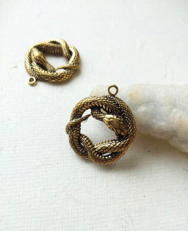 Intricate Brass Twisted Snake Charm Pendant