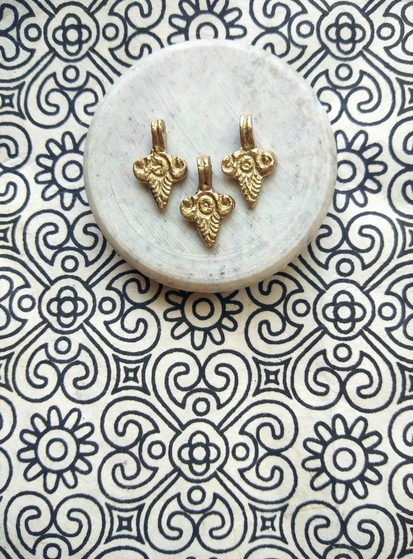 Vintage brass charms
